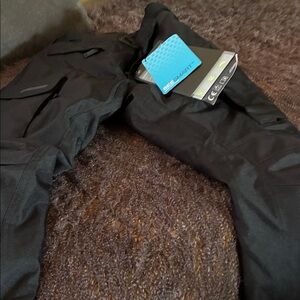 Black women or girls motorcycle pets by Rev’It